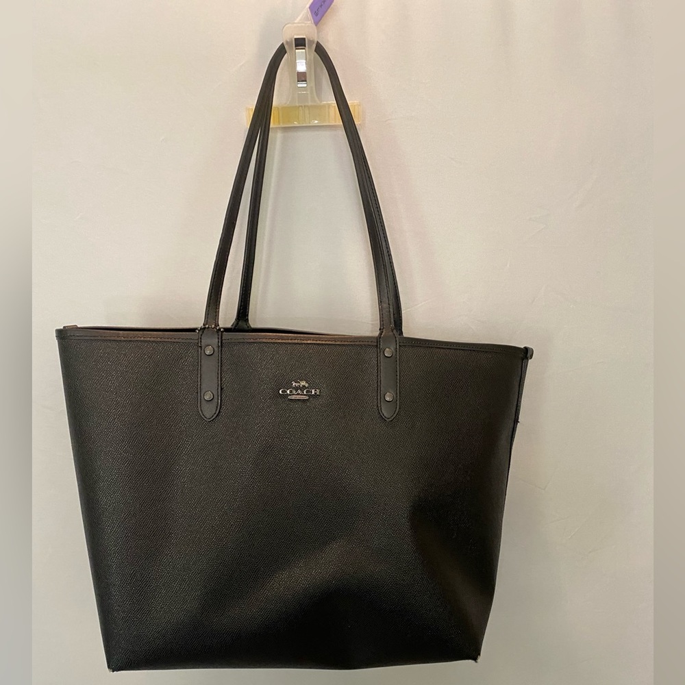Black Reversible Coach Tote bag. Cherry graffiti detail.